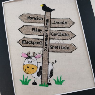 Summer Signpost with Cow